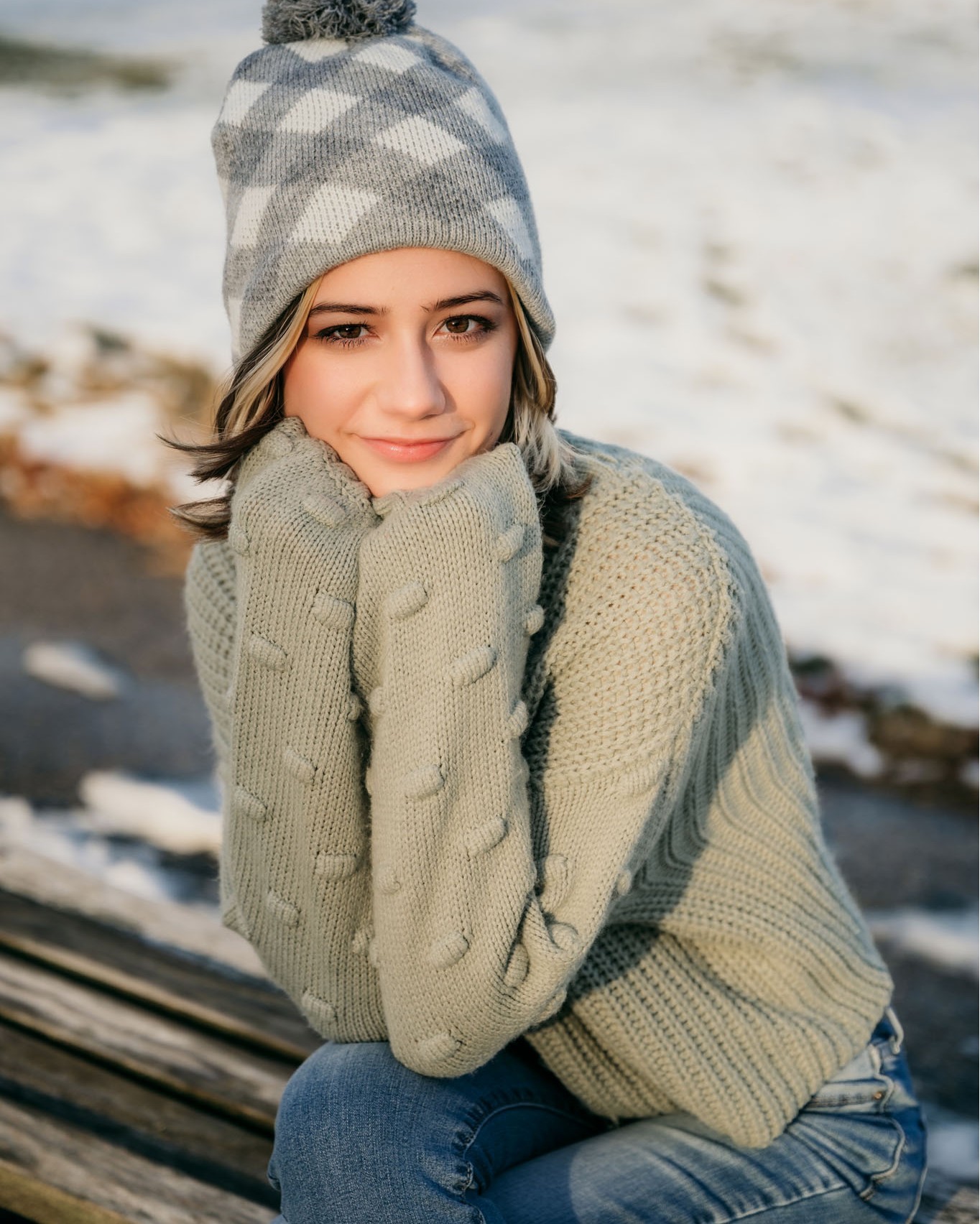 Best Time to Book My Senior Photo: senior girl wearing stocking cap in the winter